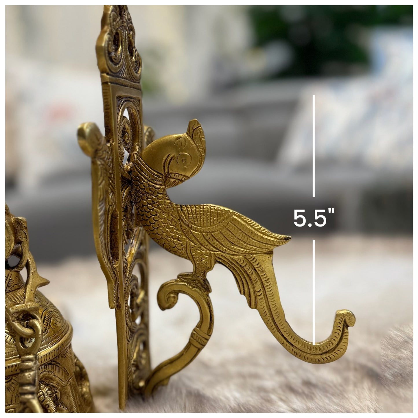 Brass Temple bell engraved with Ganesha in musical avatars having peacock hooks