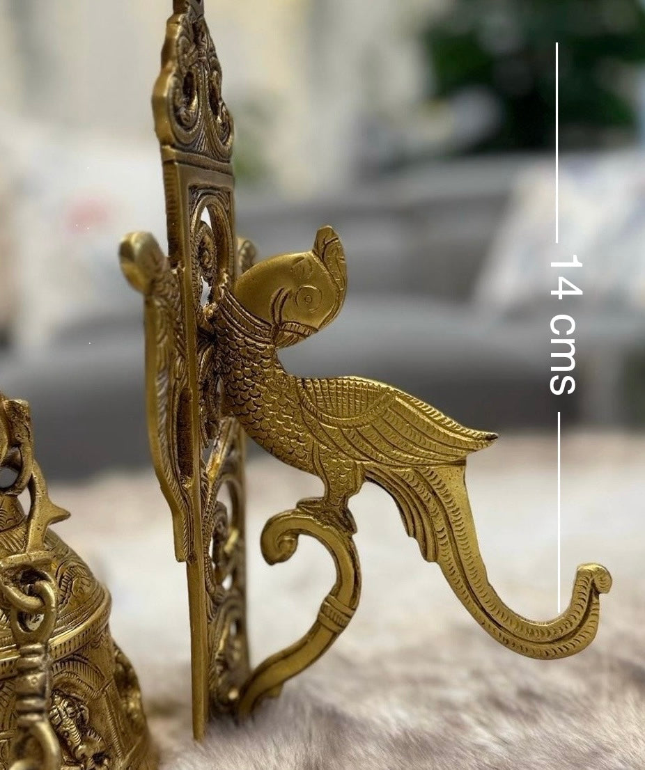 Brass Temple bell engraved with Ganesha in musical avatars having peacock hooks