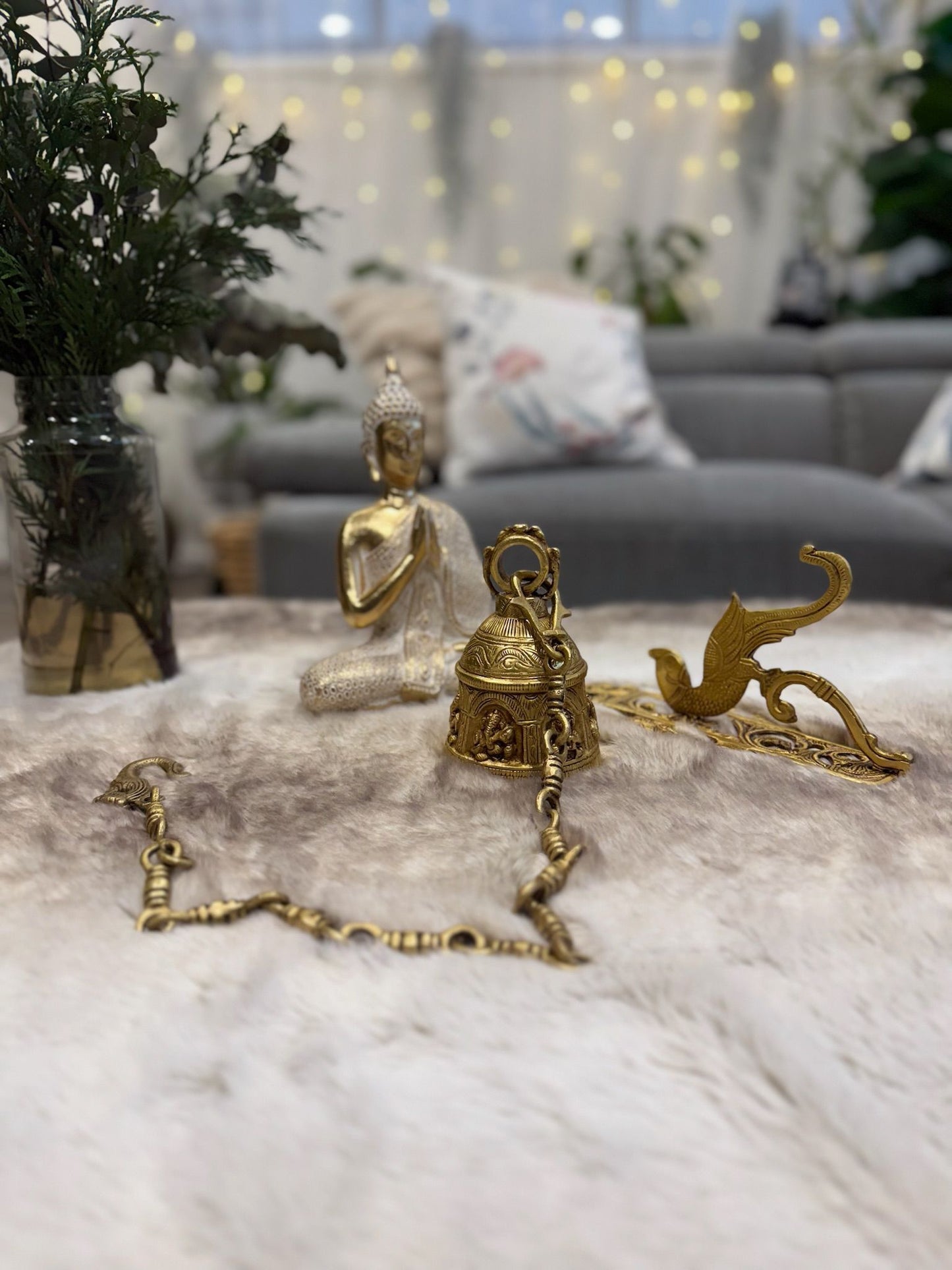 Brass Temple bell engraved with Ganesha in musical avatars having peacock hooks